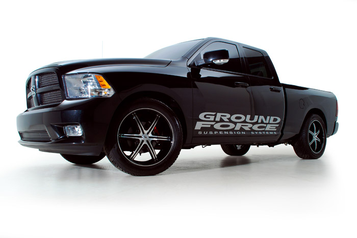 Featuring Lexani LX-6 22X9.5 Wheels Wrapped in General Grabber UHP 305x45x22 tires with Lowering Kit #9863 Installed